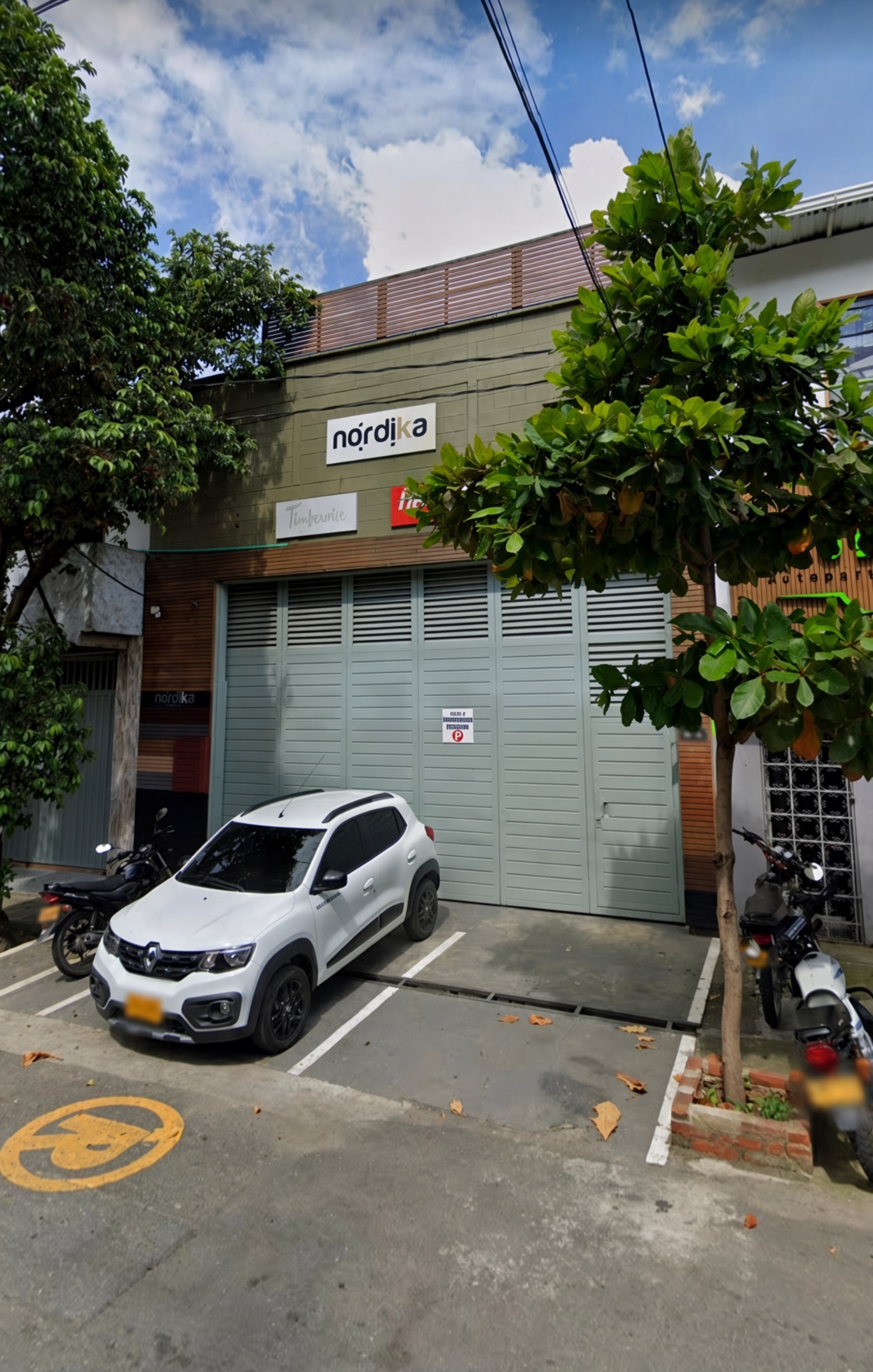 Current warehouse street entrance by day